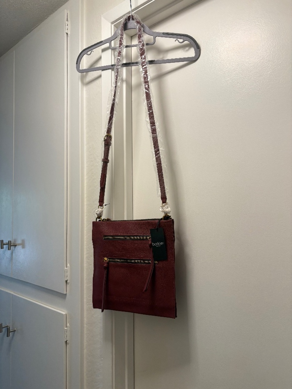 NWT Botkier burgundy leather “Chelsea pancake” crossbody bag